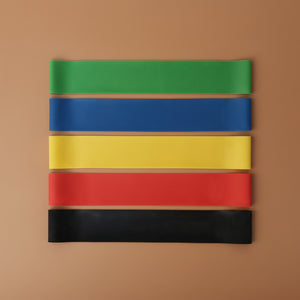 Stretch and pull-up resistance bands in use during yoga workout