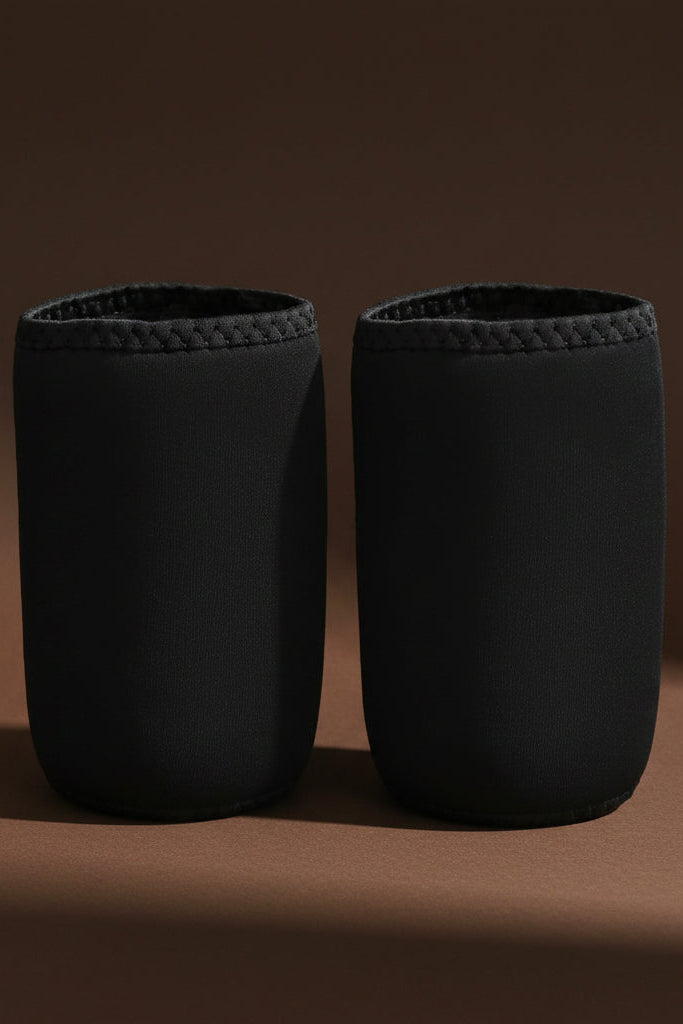 Black sauna thigh sleeves for sweat and compression training