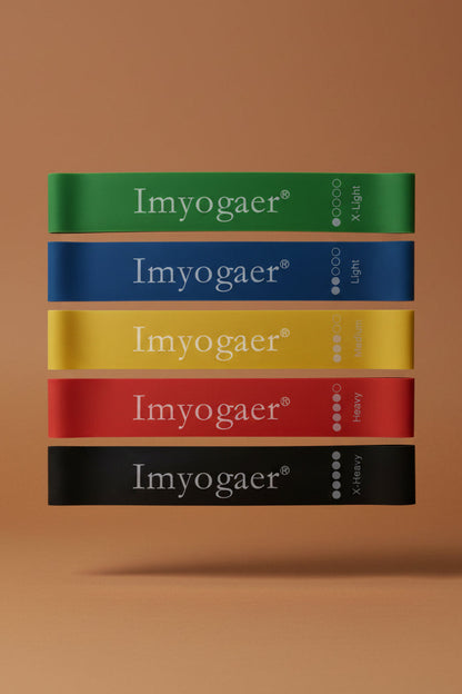 Green, blue, yellow, red and black loop exercise bands