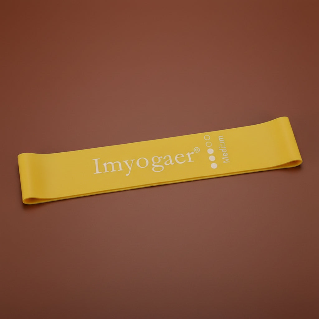 Yellow resistance band for yoga and stretching