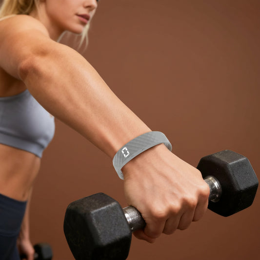 Woman wearing smart sleep tracker wristband during workout