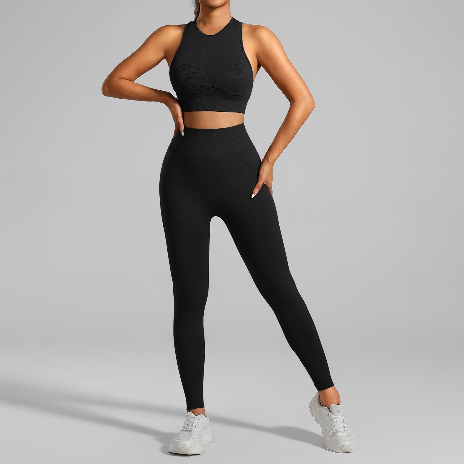 Black quick-dry yoga set with moisture-wicking crop top