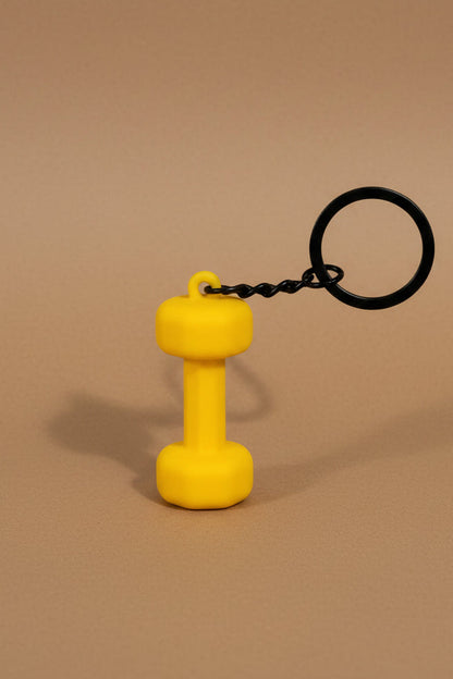 Yellow dumbbell-shaped keychain