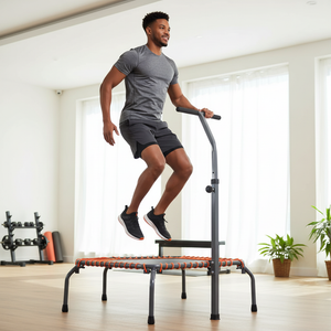 Mixed-race man jumping on foldable fitness trampoline lifestyle photo