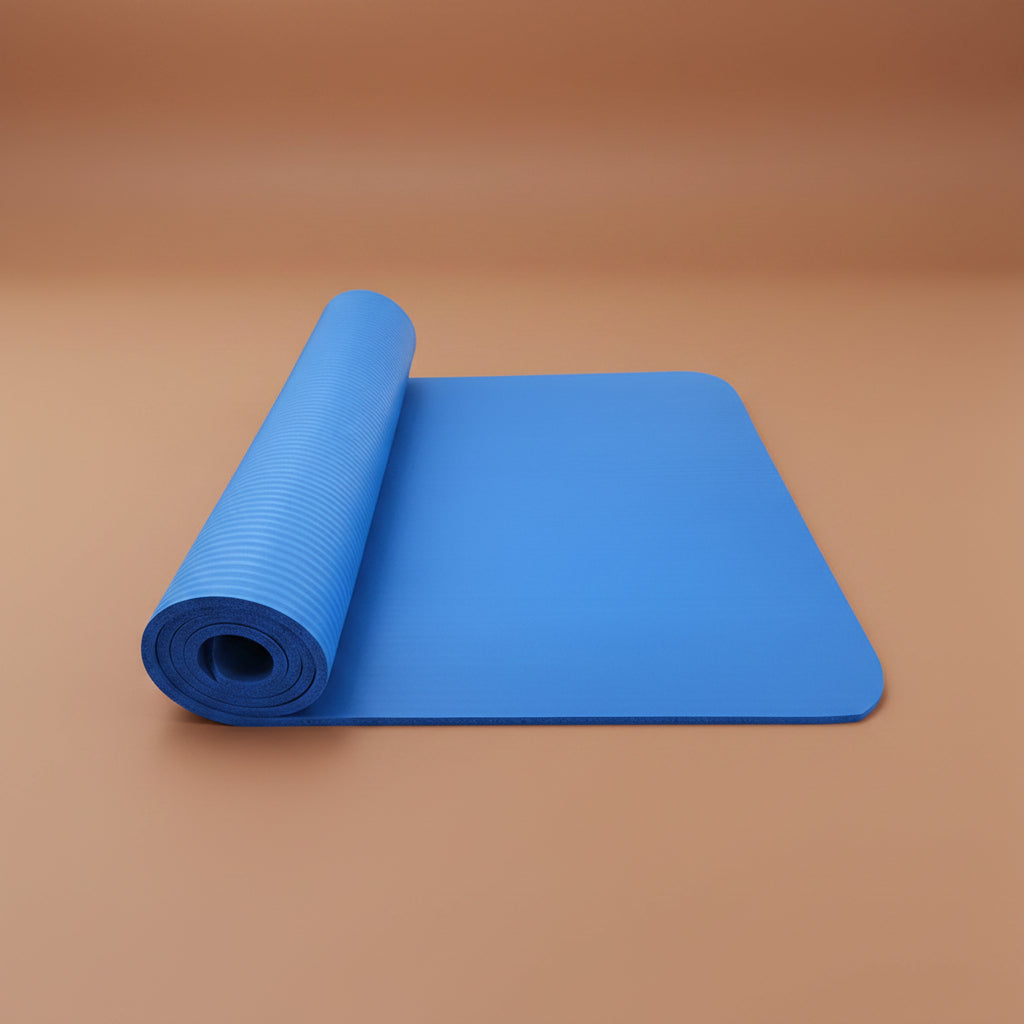 Blue non-slip yoga mat, rolled for storage