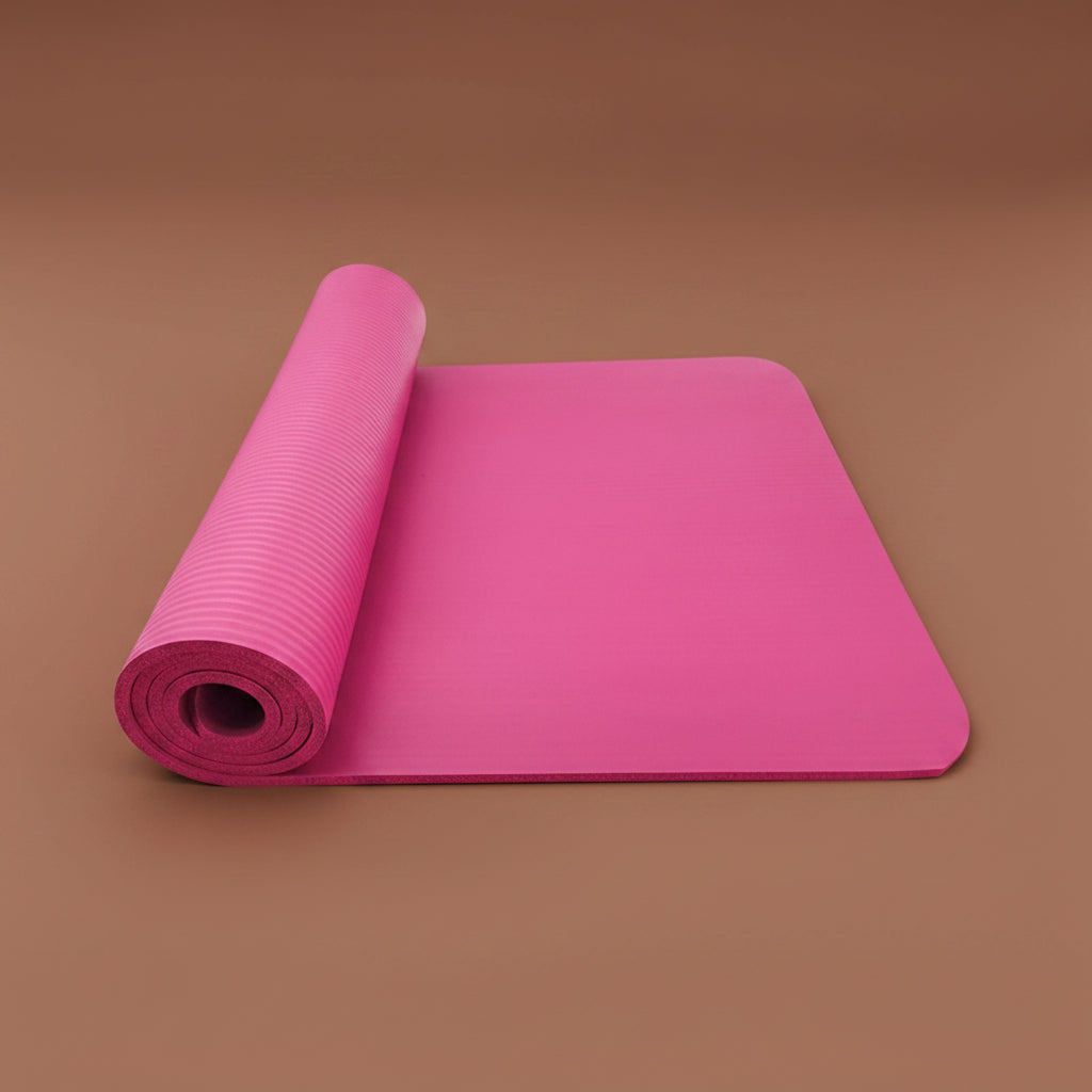 Pink yoga and fitness mat, rolled view