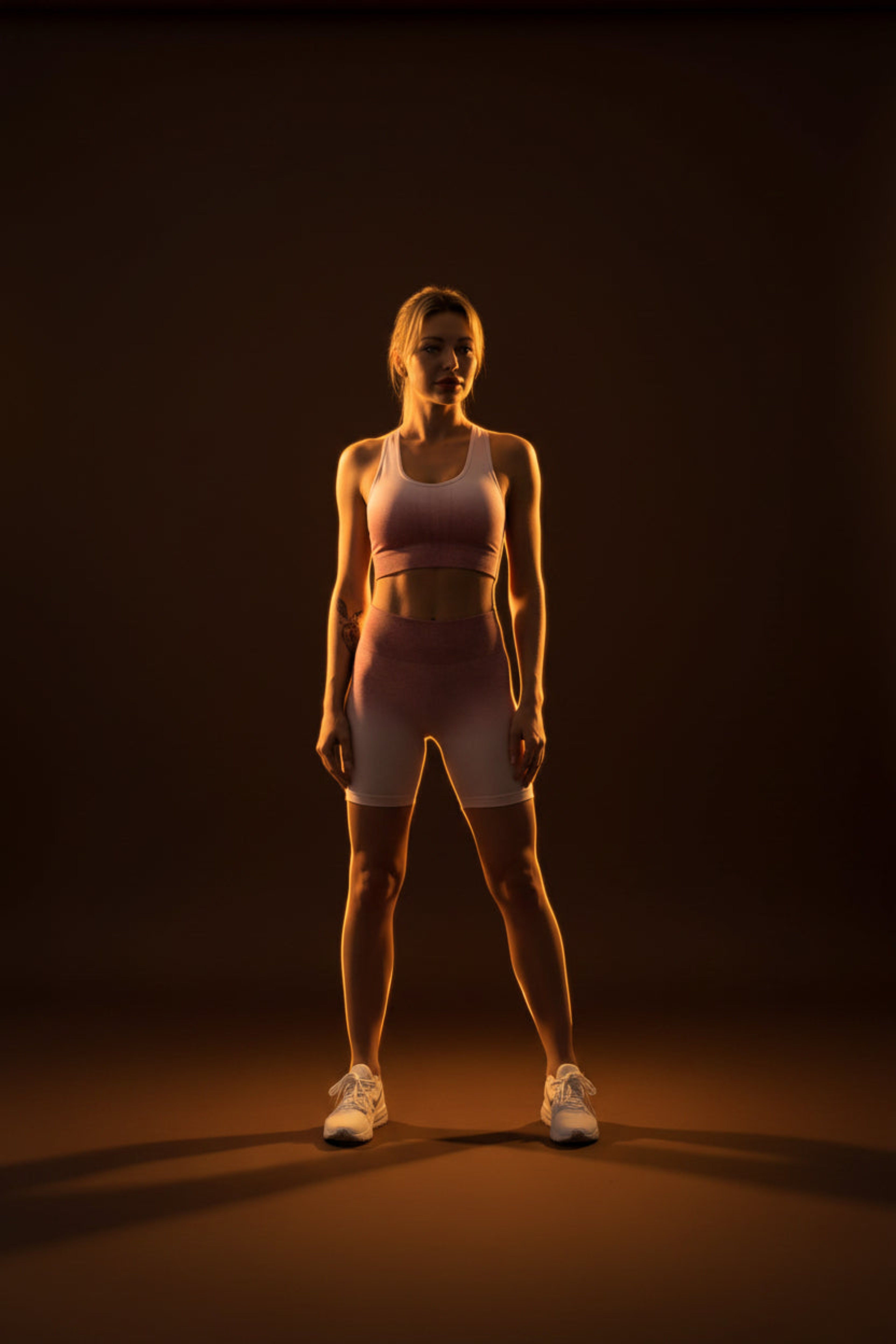 "Woman wearing gradient yoga tracksuit set, silhouette