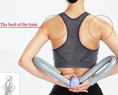 Person holding an exercise flexor behind their back